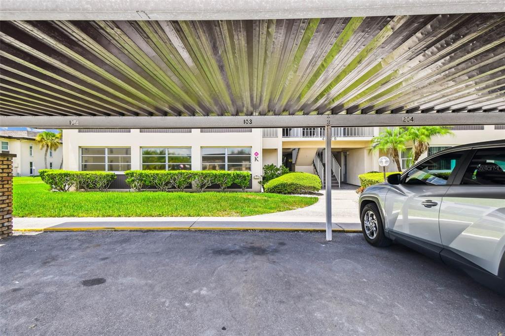 4726 Marine Parkway, Unit 103 New Port Richey, FL 34652 - Photo 45 of 81 a view of yard with swimming pool and furniture