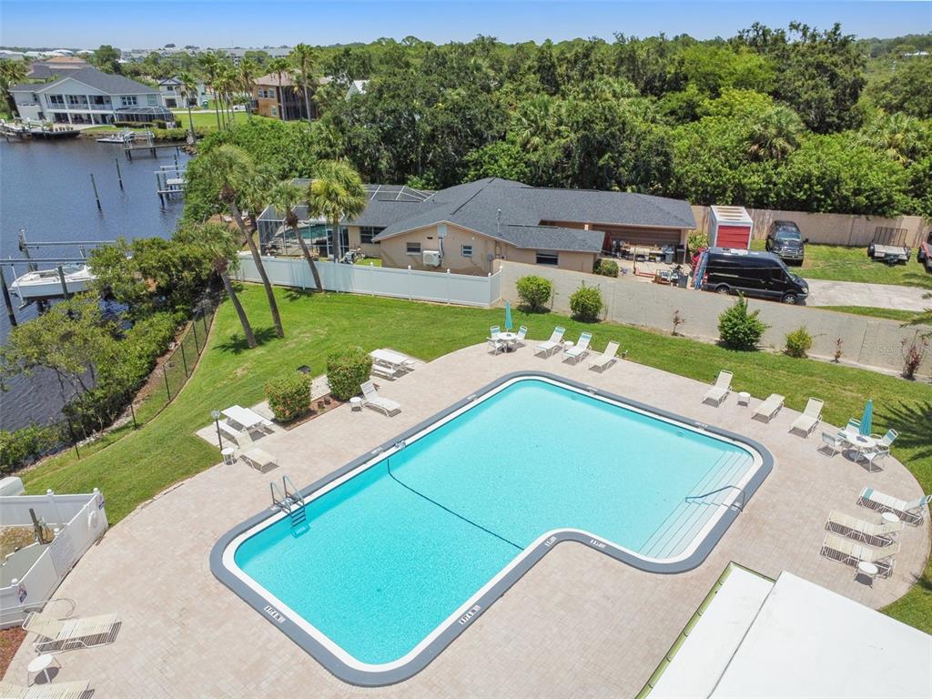4726 Marine Parkway, Unit 103 New Port Richey, FL 34652 - Photo 54 of 81 an aerial view of a tennis court
