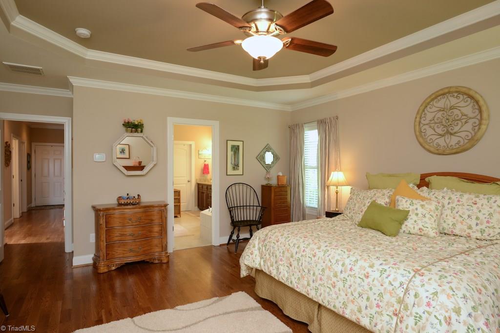 5002 Bennington Way High Point, NC 27262 - Photo 14 of 30 Huge master suite with hardwoods and tray ceiling