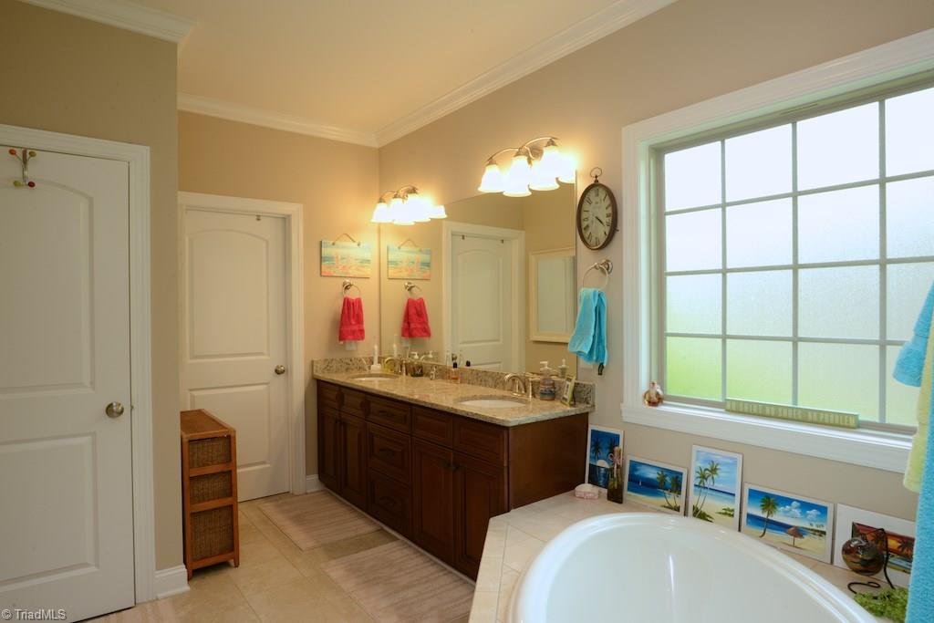 5002 Bennington Way High Point, NC 27262 - Photo 17 of 30 Master bath with soaker tub and separate shower....huge closet