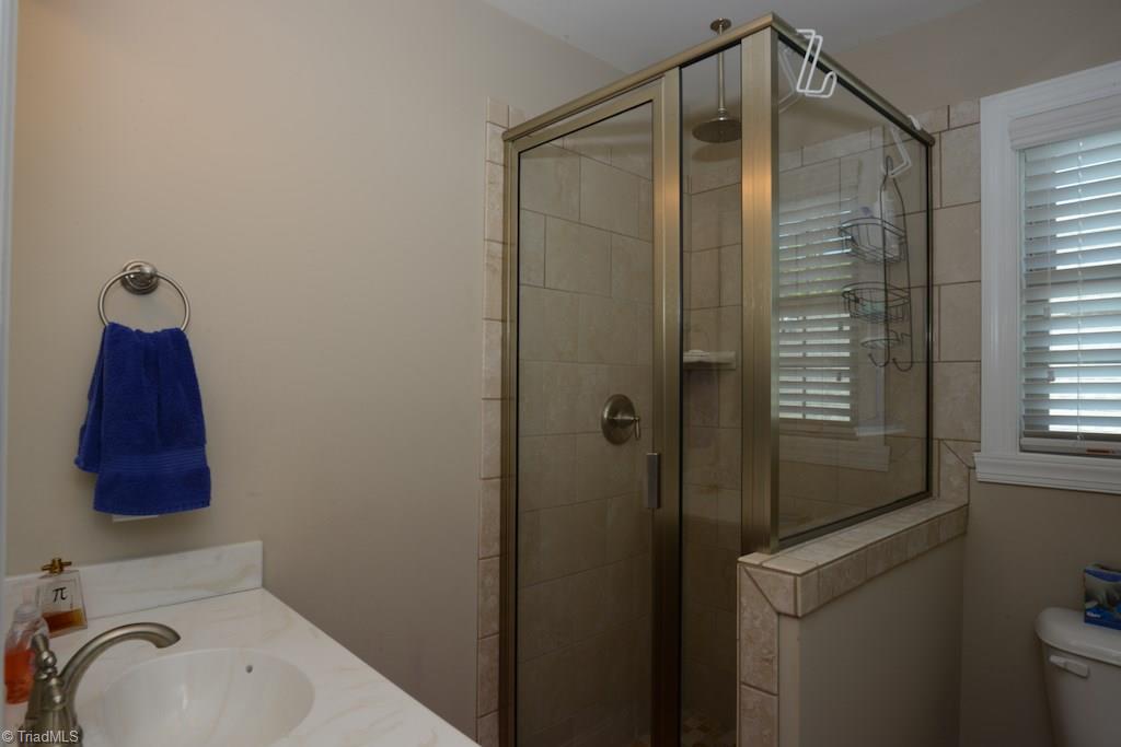5002 Bennington Way High Point, NC 27262 - Photo 23 of 30 This 3rd full bath is location upstairs with the bonus room so this are could easily be a 5th bedroom