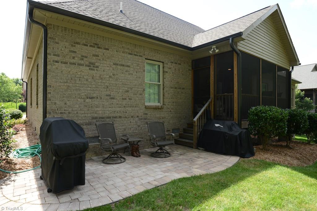 5002 Bennington Way High Point, NC 27262 - Photo 27 of 30 Back of home with expanded patio