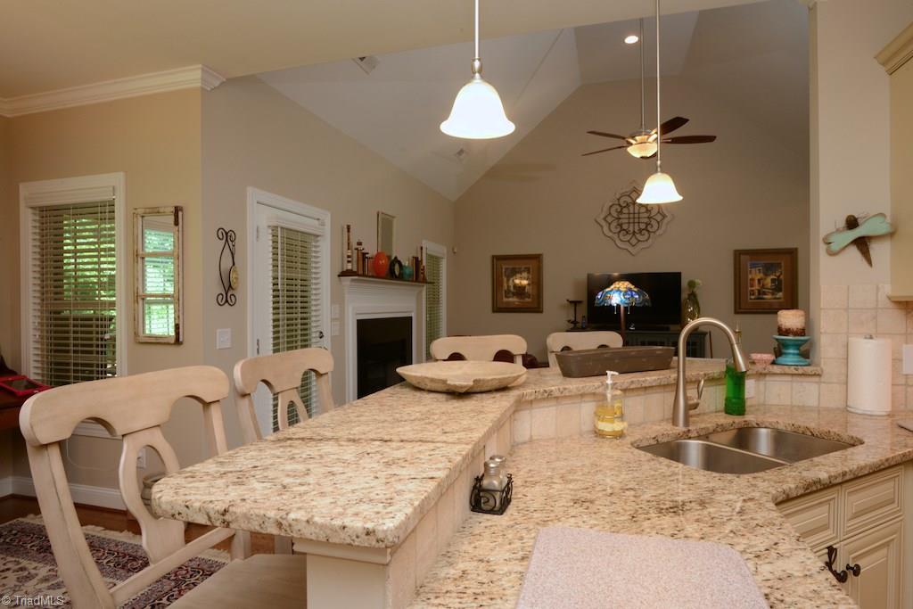 5002 Bennington Way High Point, NC 27262 - Photo 6 of 30 Plenty of counter seating in the spacious kitchen with wonderful cabinet space