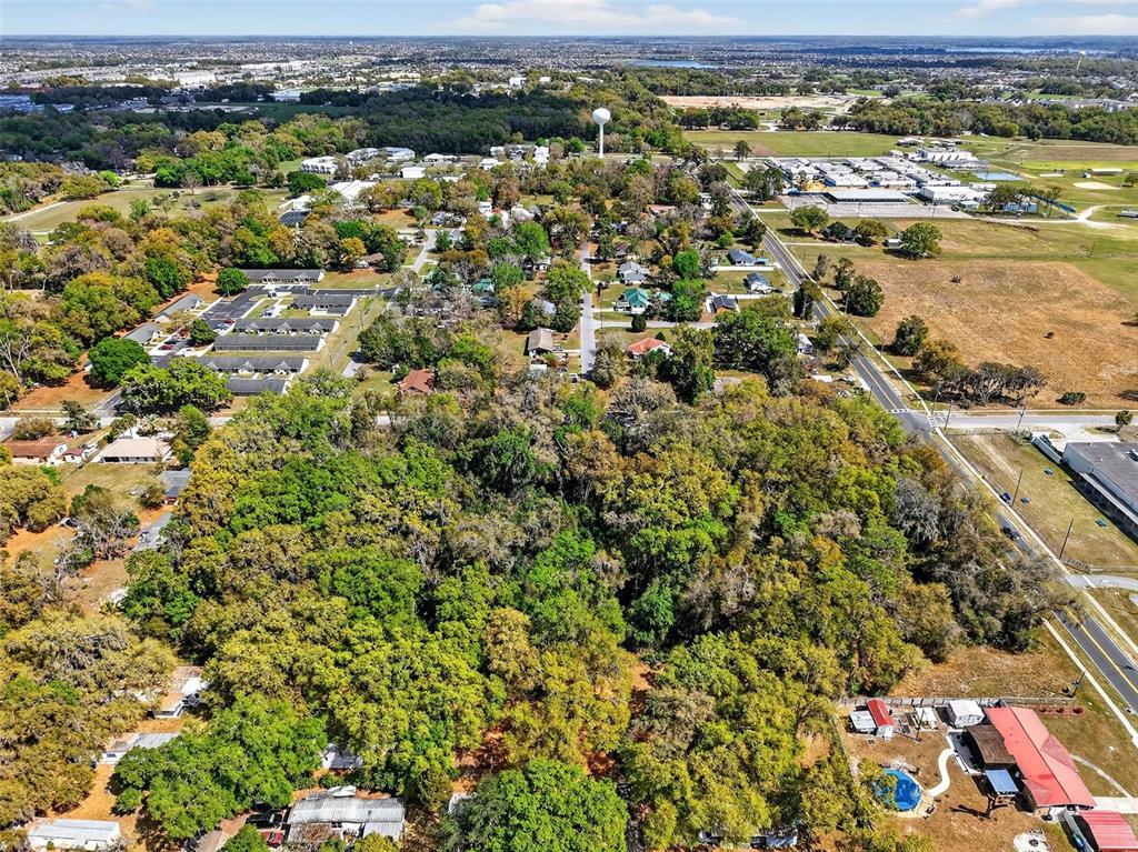 South Old Wire Road Wildwood, FL 34785 - Photo 4 of 13 an aerial view of residential houses with outdoor space