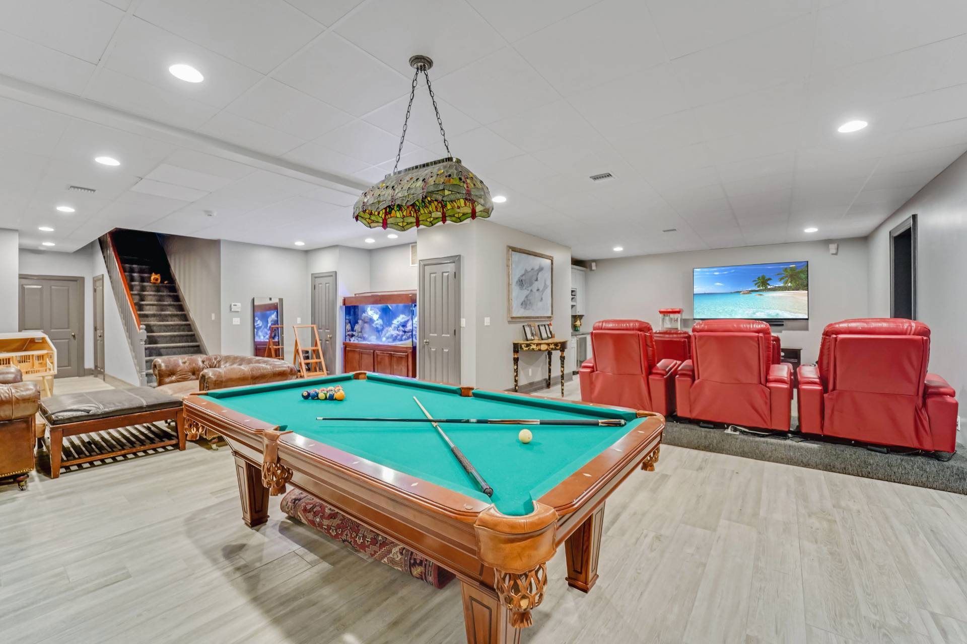 53 South Road Westhampton Beach, NY 11978 - Photo 21 of 28 a room with pool table and windows