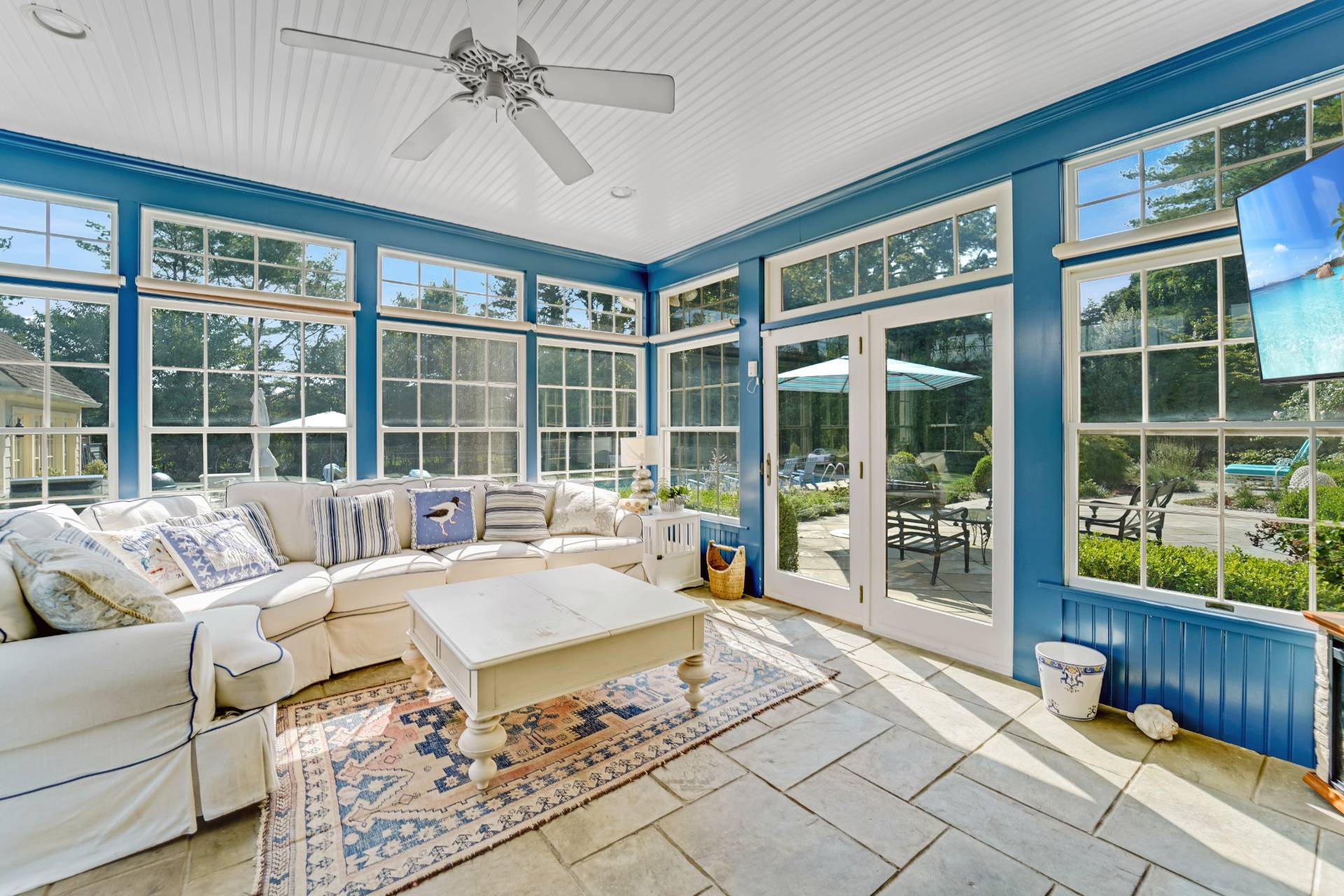 53 South Road Westhampton Beach, NY 11978 - Photo 23 of 28 a living room with furniture and a large window