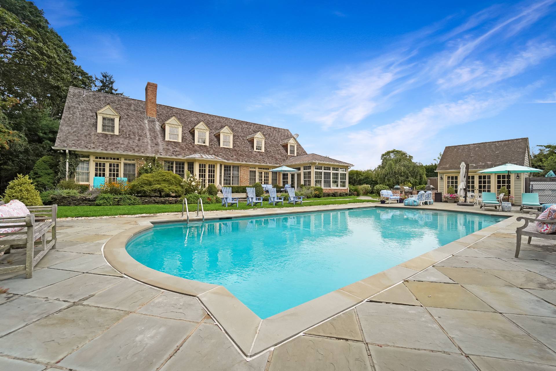 53 South Road Westhampton Beach, NY 11978 - Photo 26 of 28 a view of a swimming pool and a terrace