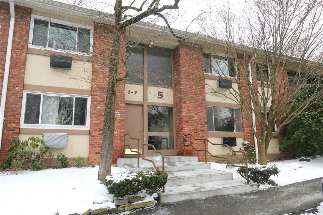 a brick building with a large windows