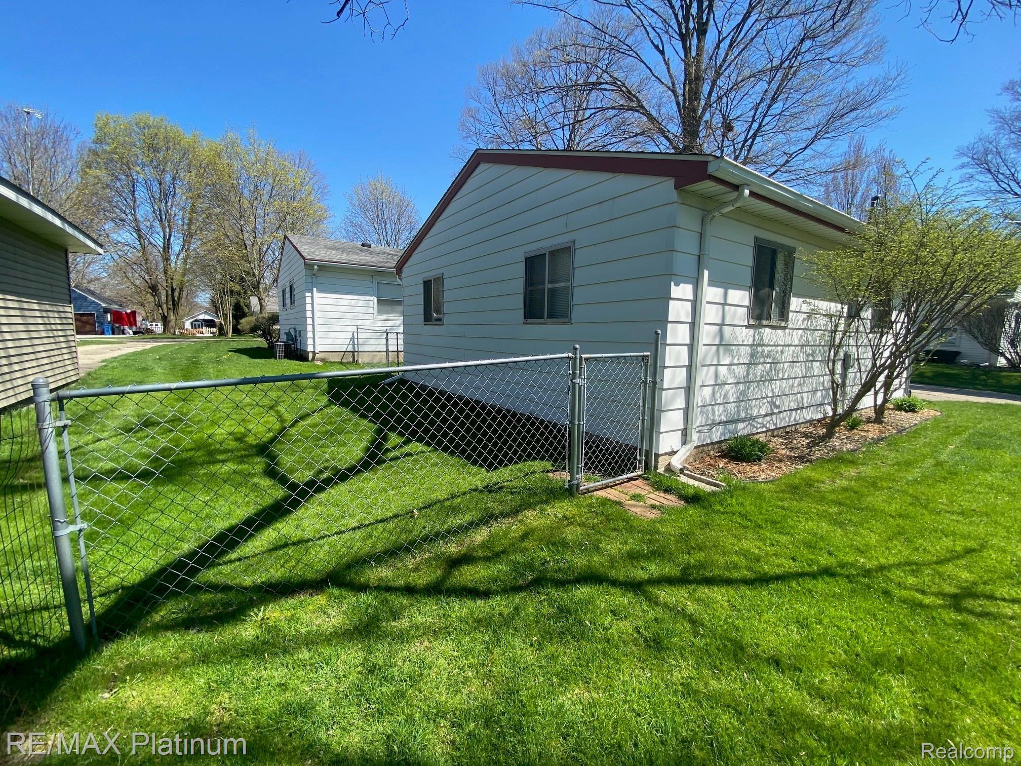 709 West Brooks Street Howell, MI 48843 - Photo 14 of 20 Fenced Yard