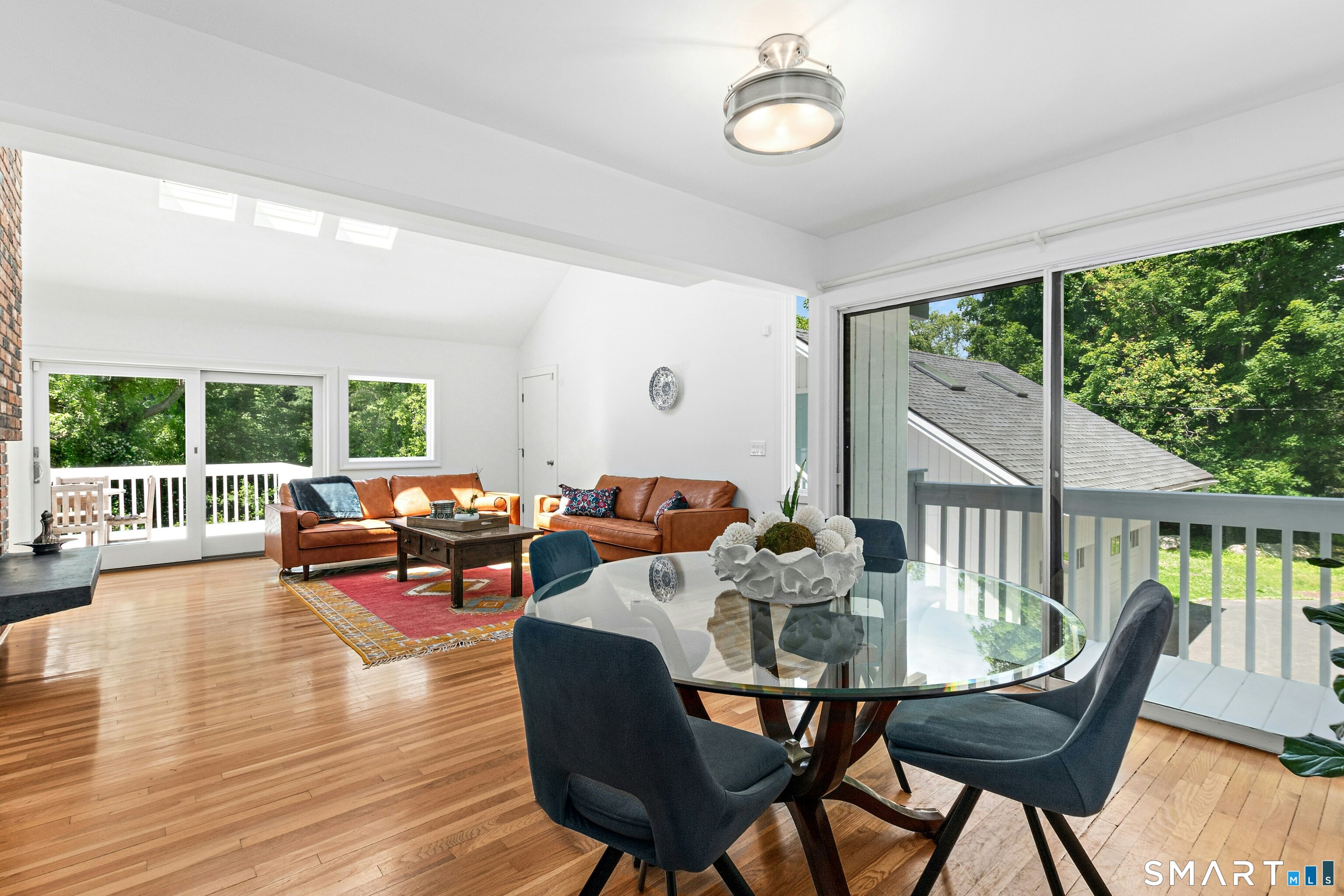 38 Old Redding Road Weston, CT 06883 - Photo 10 of 40 The Dining Room also has access to its own private balcony and is enveloped in sunlight.