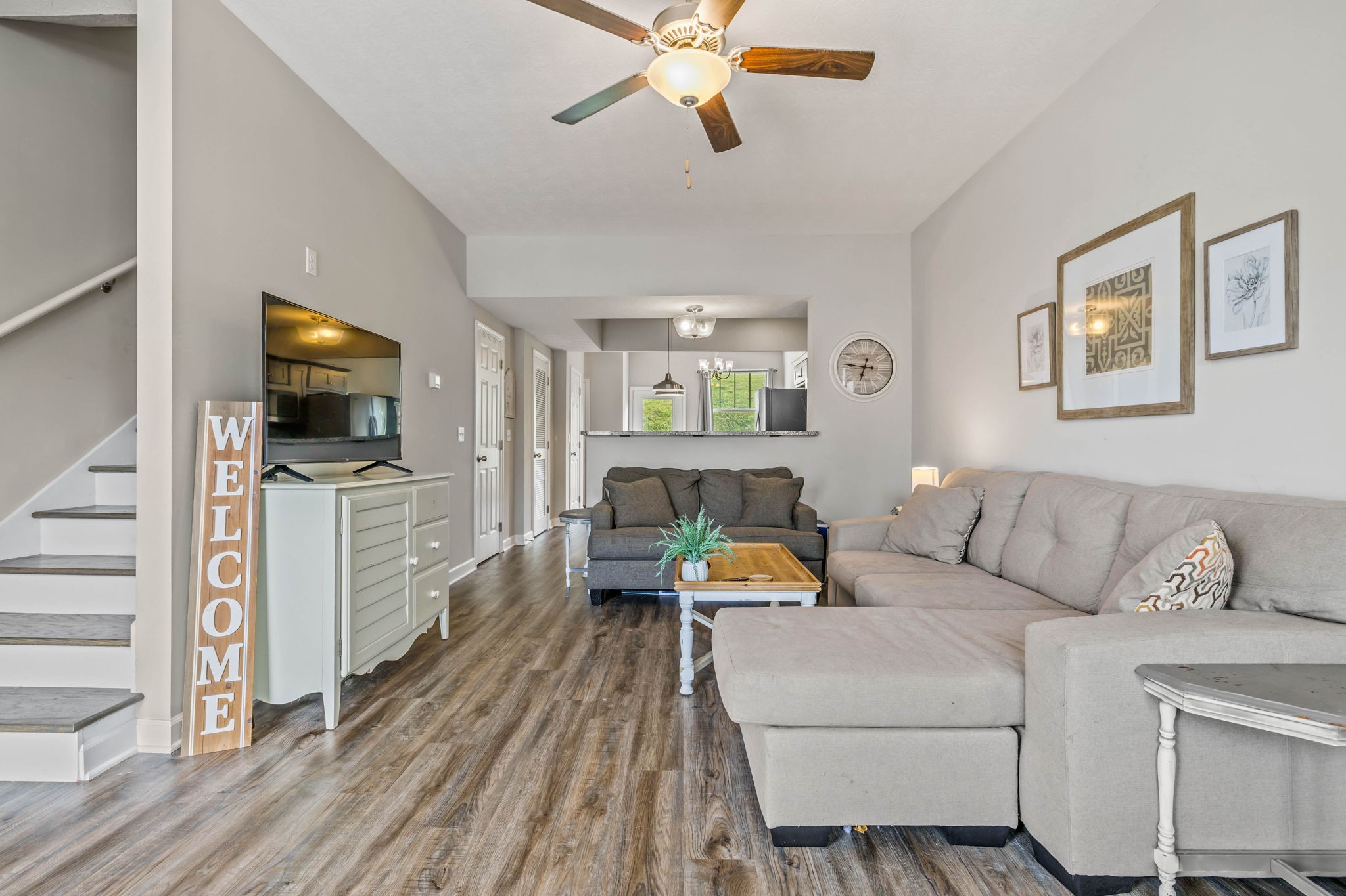 1382 Rural Hill Road, Unit 359 Antioch, TN 37013 - Photo 6 of 33 a living room with furniture and a flat screen tv