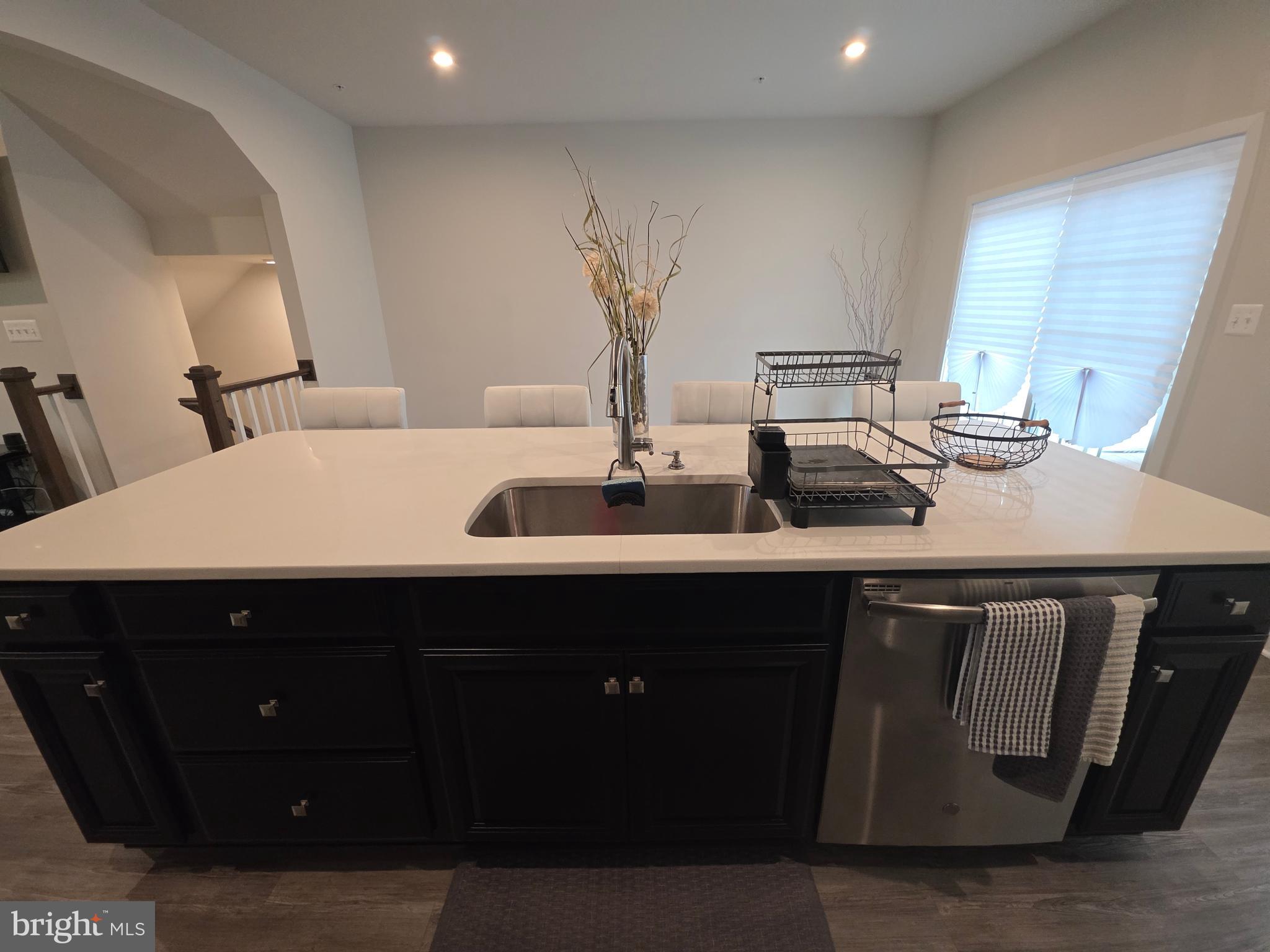 14510 Hunts Farm Road Brandywine, MD 20613 - Photo 28 of 74 a kitchen with a sink and a refrigerator