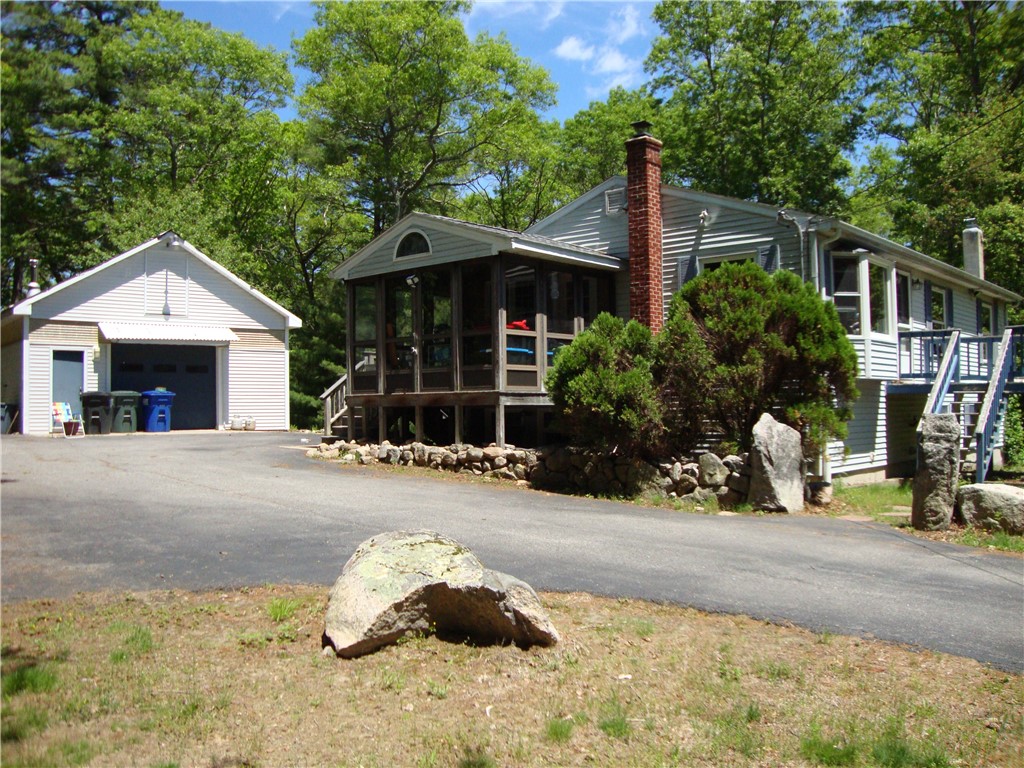 239 John Potter Road West Greenwich, RI 02817 - Photo 2 of 23 side view with 3 season room & garage