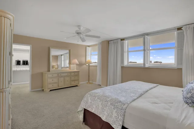 a bathroom with a double vanity sink and mirror