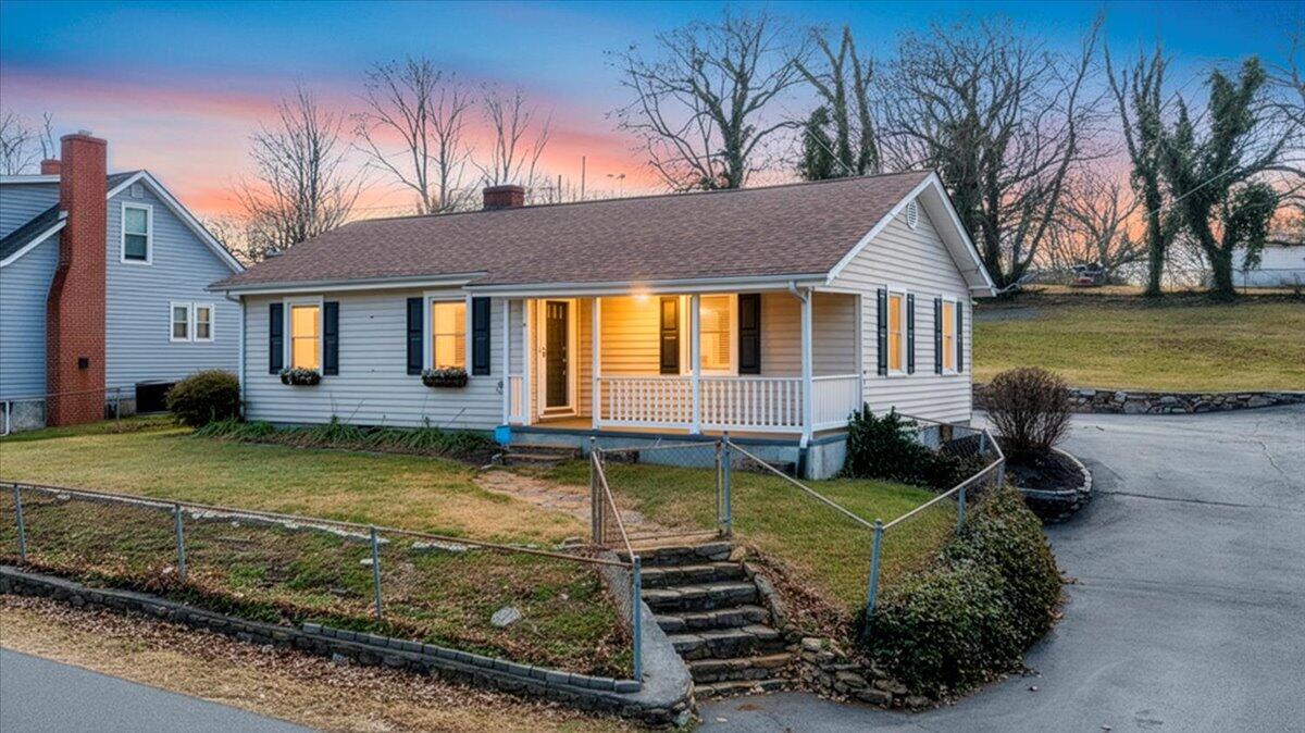 1902 Springfield Avenue Salem, VA 24153 - Photo 1 of 43 a view of a house with swimming pool and a yard