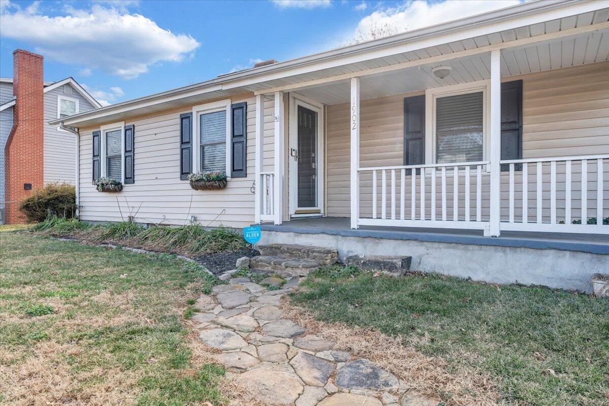 1902 Springfield Avenue Salem, VA 24153 - Photo 3 of 43 a front view of a house with garden