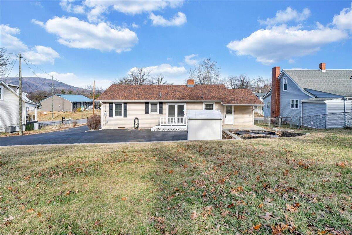 1902 Springfield Avenue Salem, VA 24153 - Photo 31 of 43 a view of a big house with a big yard and large tree