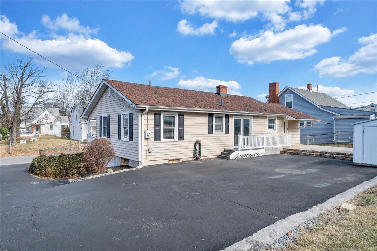 1902 Springfield Avenue Salem, VA 24153 - Photo 33 of 43 a front view of a house with a garden