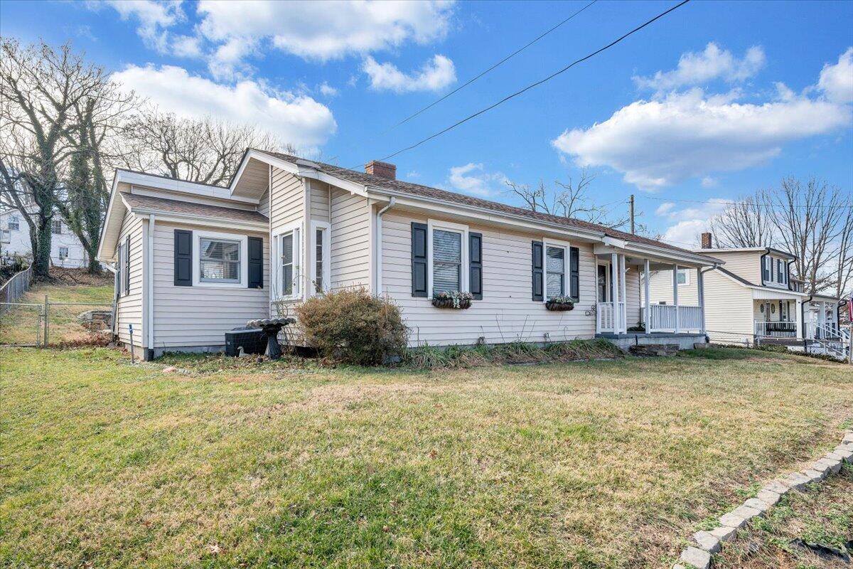 1902 Springfield Avenue Salem, VA 24153 - Photo 36 of 43 a view of a house with a big yard and a large tree