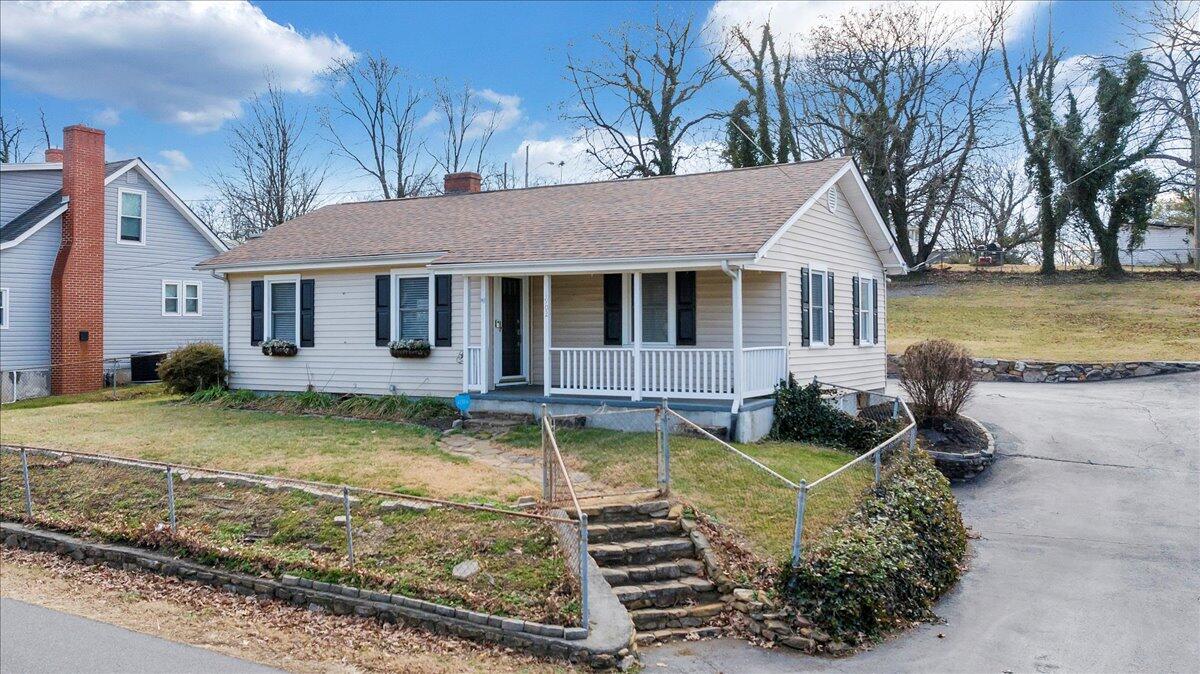 1902 Springfield Avenue Salem, VA 24153 - Photo 43 of 43 a view of a house with swimming pool and a yard