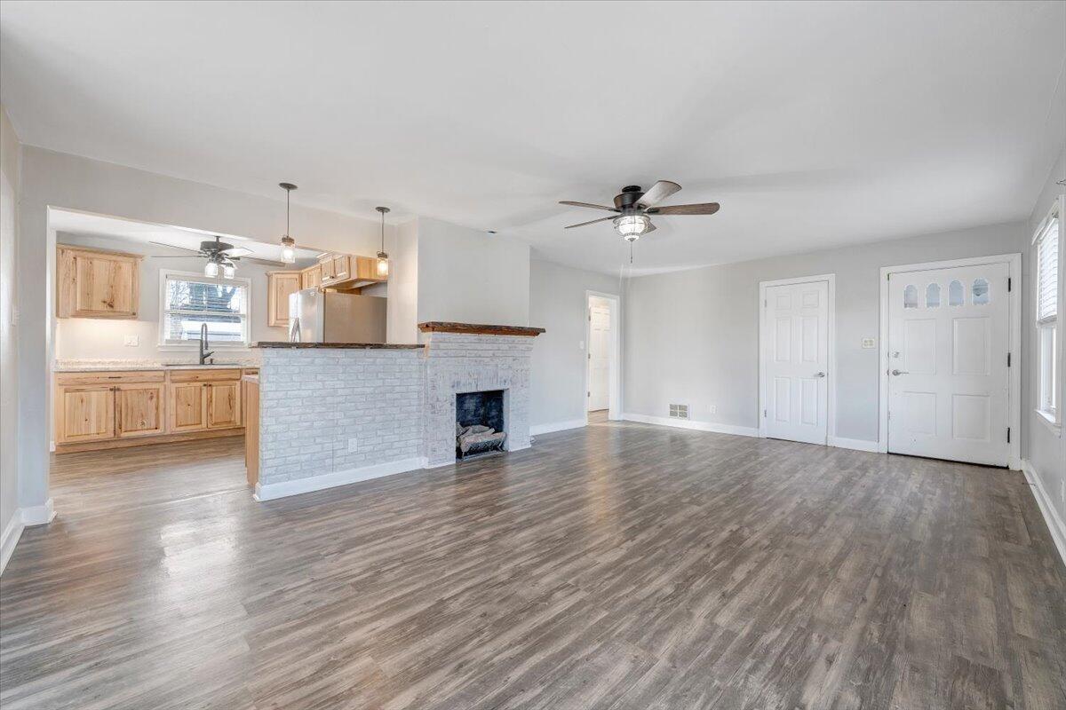 1902 Springfield Avenue Salem, VA 24153 - Photo 6 of 43 a view of a kitchen with wooden floor and a sink