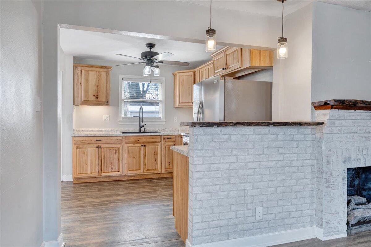 1902 Springfield Avenue Salem, VA 24153 - Photo 10 of 43 a kitchen with granite countertop a sink and cabinets
