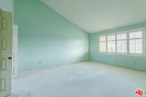an empty room with an entryway