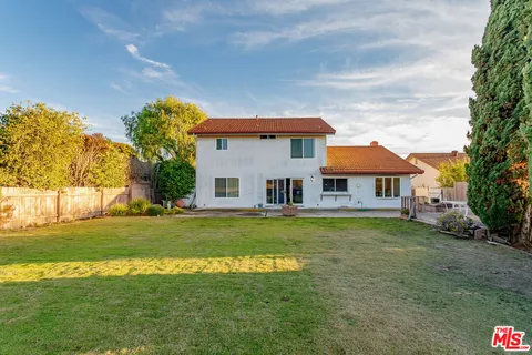 a view of a lake with a big yard