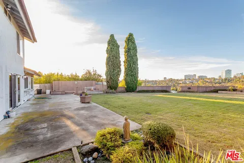 a view of a house with patio