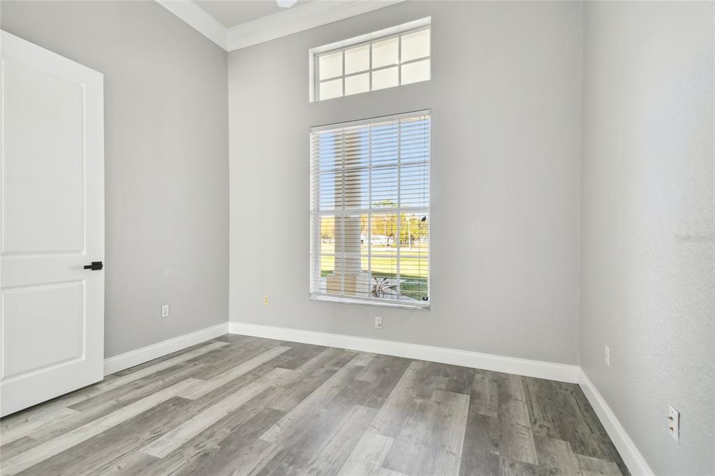 6644 Country Club Road Wesley Chapel, FL 33544 - Photo 39 of 75 an empty room with a window