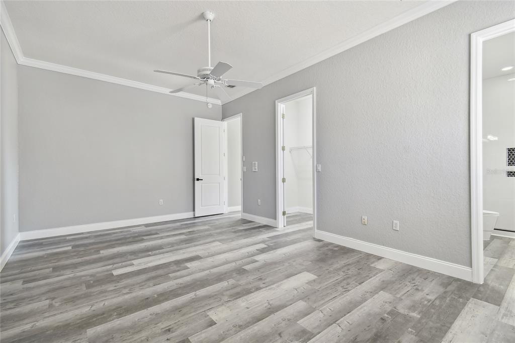 6644 Country Club Road Wesley Chapel, FL 33544 - Photo 50 of 75 a view of an empty room with a window