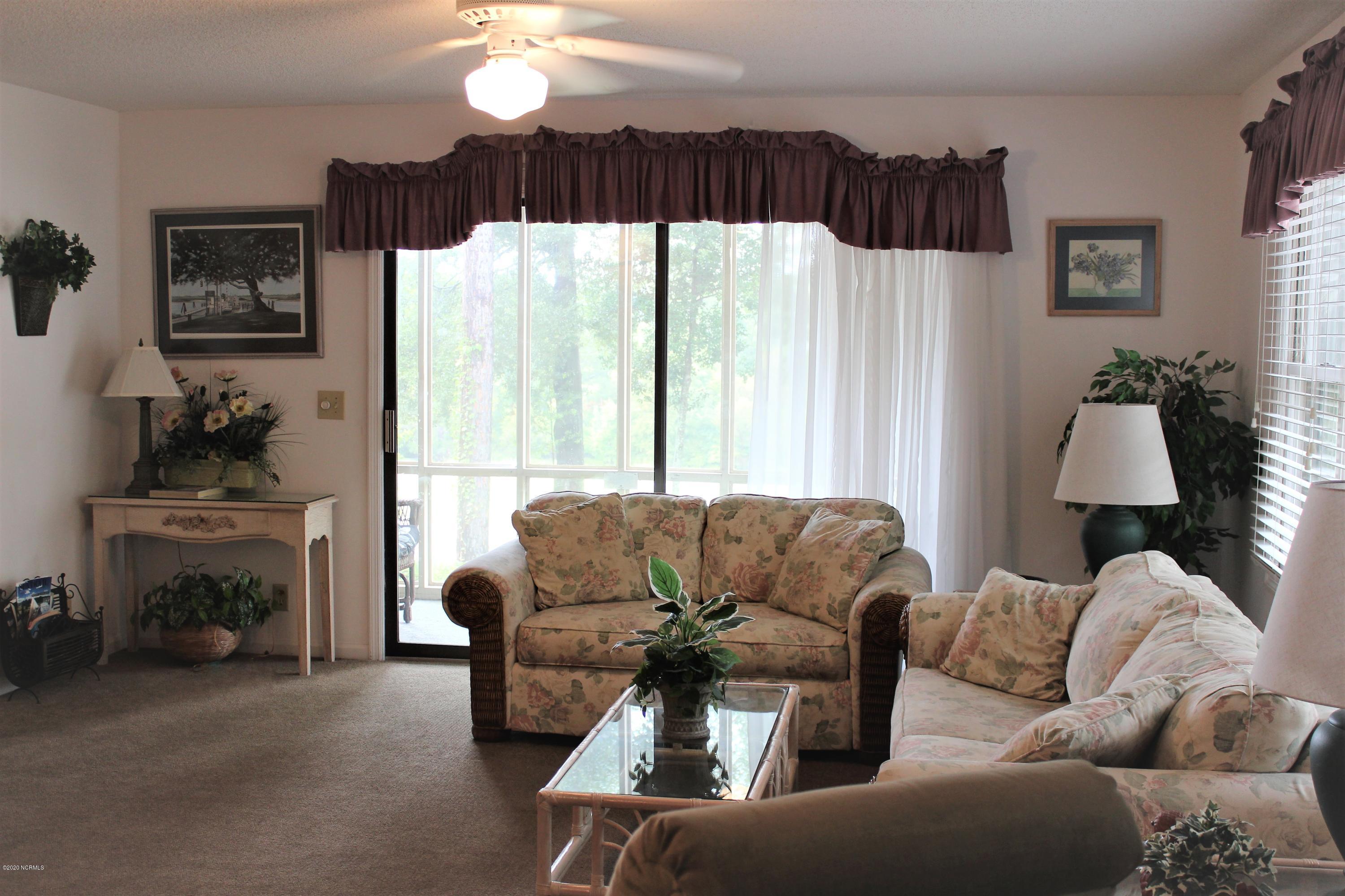 225 Clubhouse Road, Unit 704 Sunset Beach, NC 28468 - Photo 4 of 25 IMG_8661 (2)