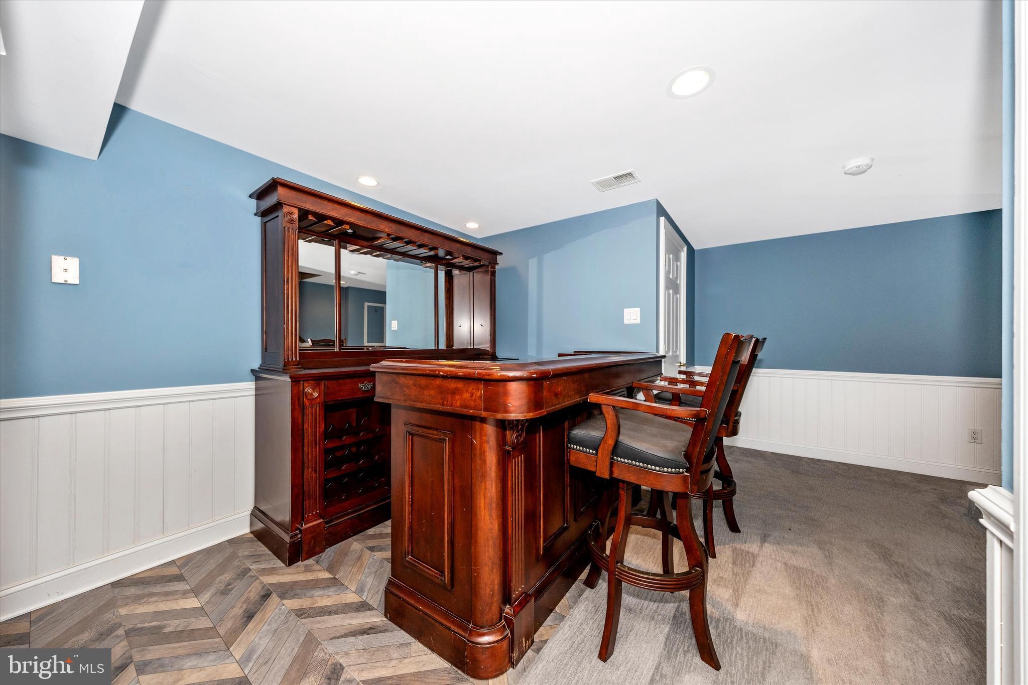 803 Apache Court Frederick, MD 21701 - Photo 30 of 46 a view of a dining room with furniture and a chandelier