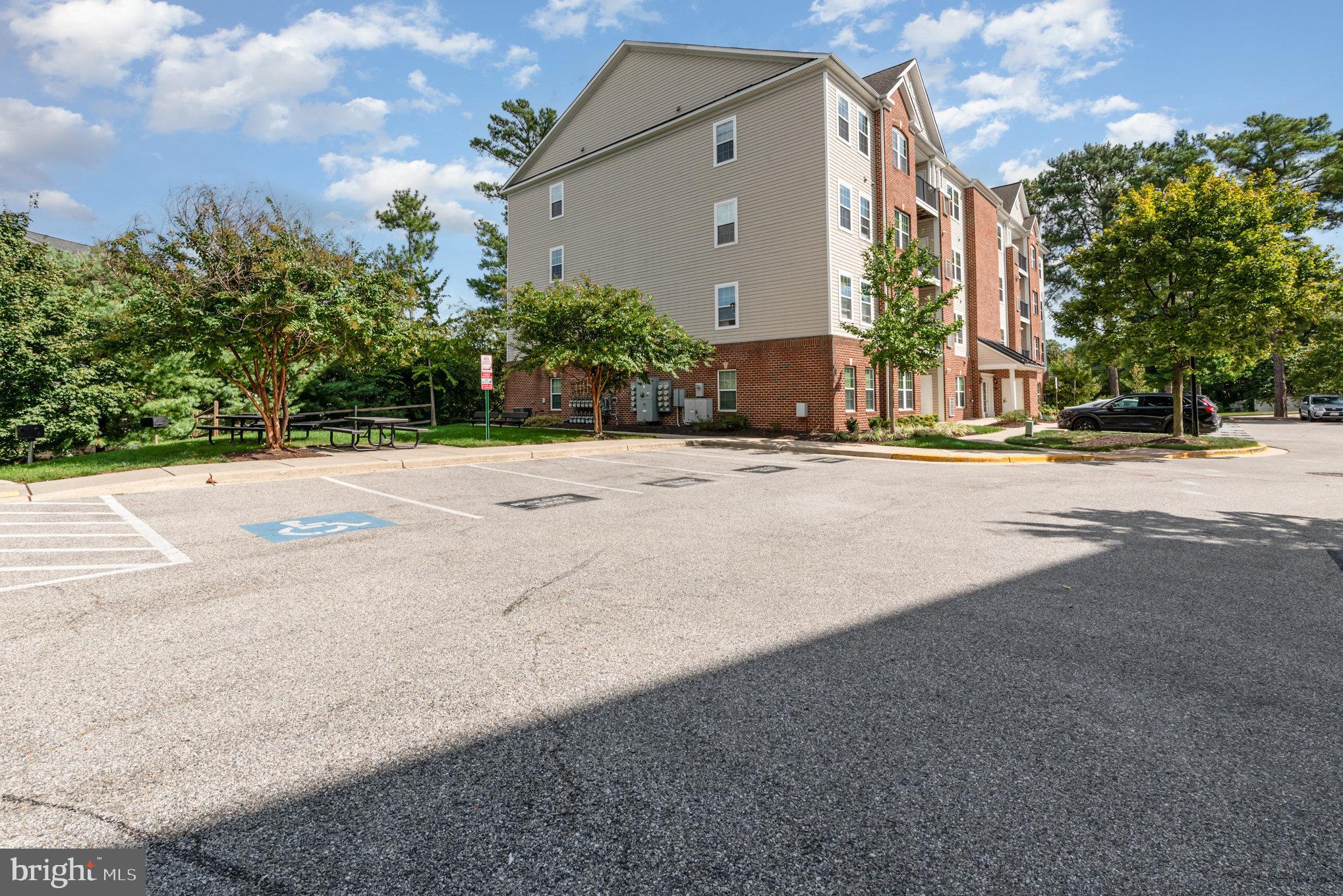 1624 Hardwick Court, Unit 402 Hanover, MD 21076 - Photo 26 of 27 a view of a house with a street