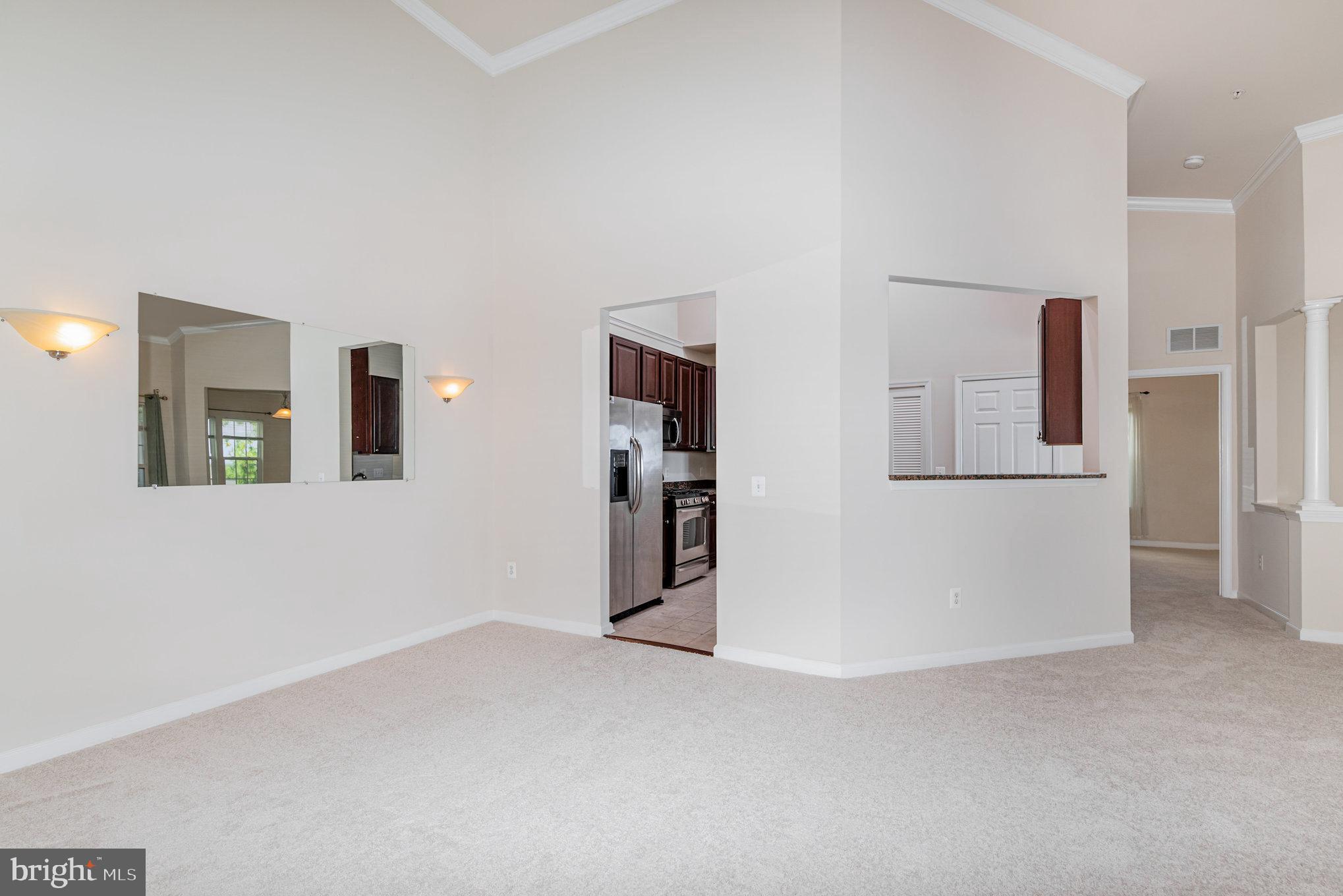 1624 Hardwick Court, Unit 402 Hanover, MD 21076 - Photo 3 of 27 a view of an empty room with window