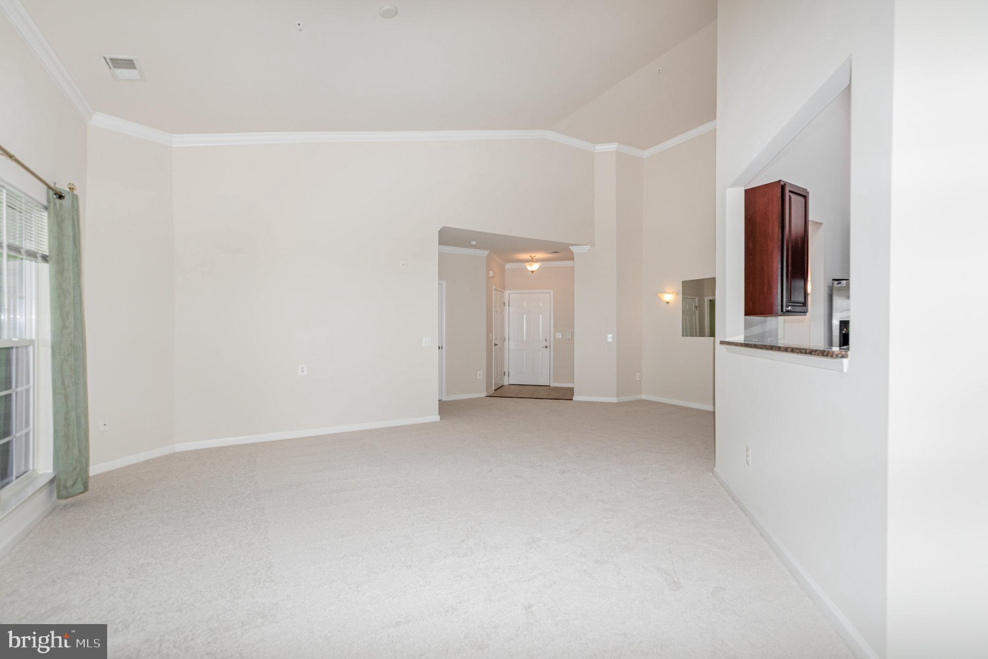 1624 Hardwick Court, Unit 402 Hanover, MD 21076 - Photo 6 of 27 a view of an empty room