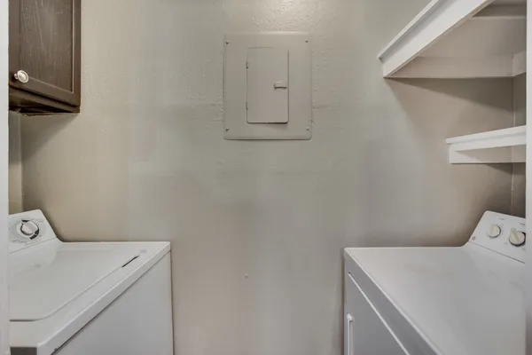a utility room with dryer and washer