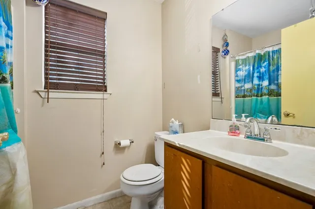 a bathroom with a sink and a toilet