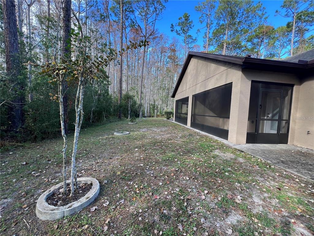 11 Ullock Place, Unit A Palm Coast, FL 32164 - Photo 10 of 10 a backyard of a house with entertaining space
