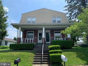 304 Haig Boulevard Reading, PA 19607 - Photo 1 of 27 a front view of a house with a yard