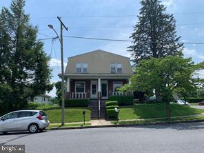 304 Haig Boulevard Reading, PA 19607 - Photo 3 of 27 a front view of a house with a garden and plants