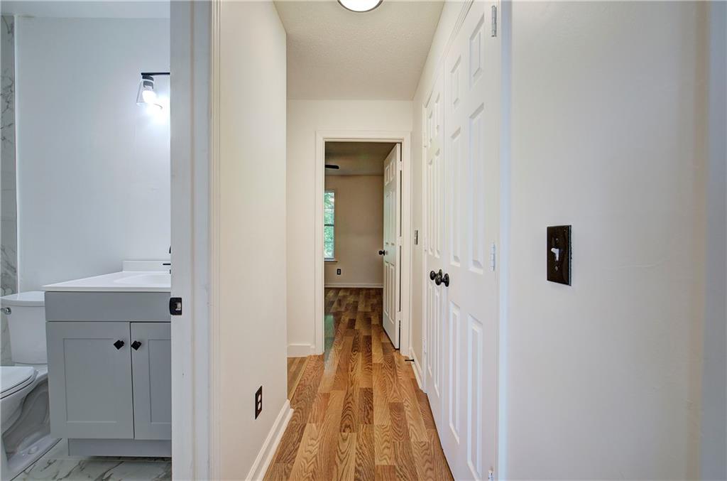22 Nottingham Drive Northwest Cartersville, GA 30121 - Photo 24 of 36 a view of a hallway with wooden floor and entryway