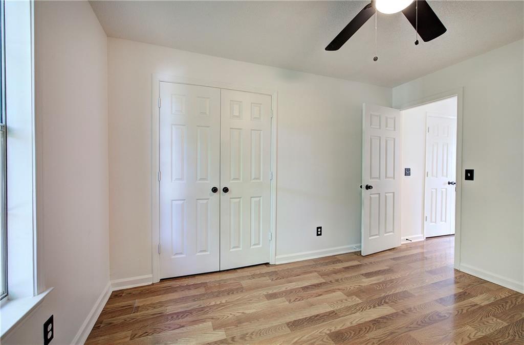 22 Nottingham Drive Northwest Cartersville, GA 30121 - Photo 26 of 36 a view of empty room with wooden floor and fan
