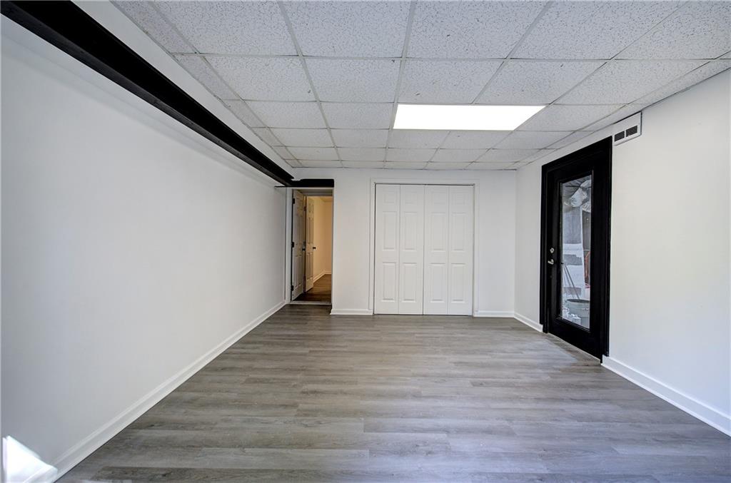22 Nottingham Drive Northwest Cartersville, GA 30121 - Photo 33 of 36 a view of an empty room with wooden floor