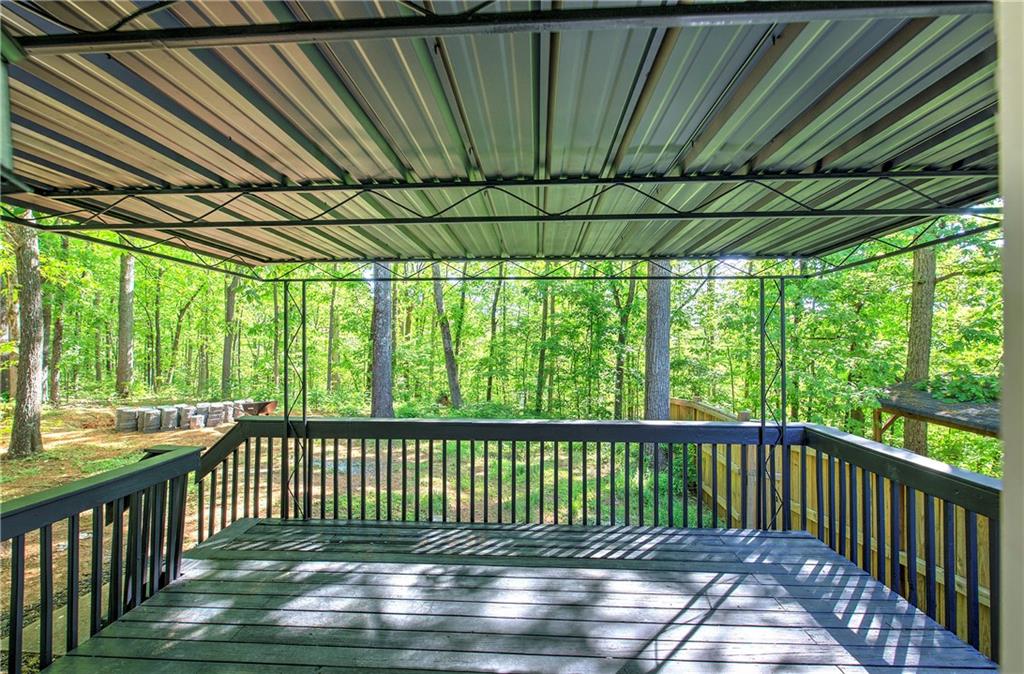 22 Nottingham Drive Northwest Cartersville, GA 30121 - Photo 34 of 36 a view of a backyard with a large window