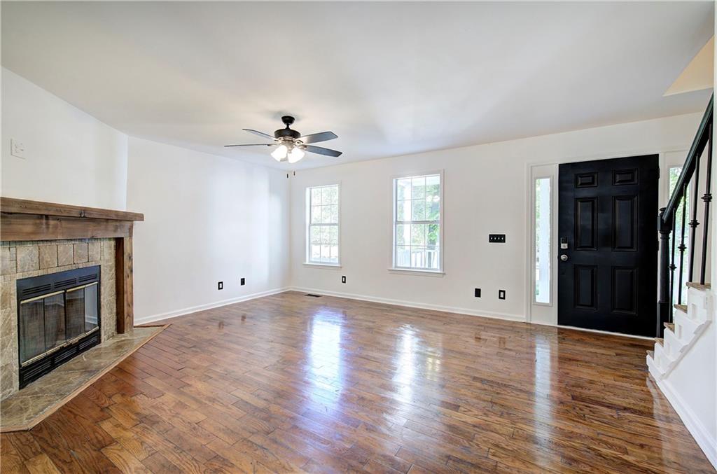 22 Nottingham Drive Northwest Cartersville, GA 30121 - Photo 8 of 36 a view of an empty room with chandelier and fireplace