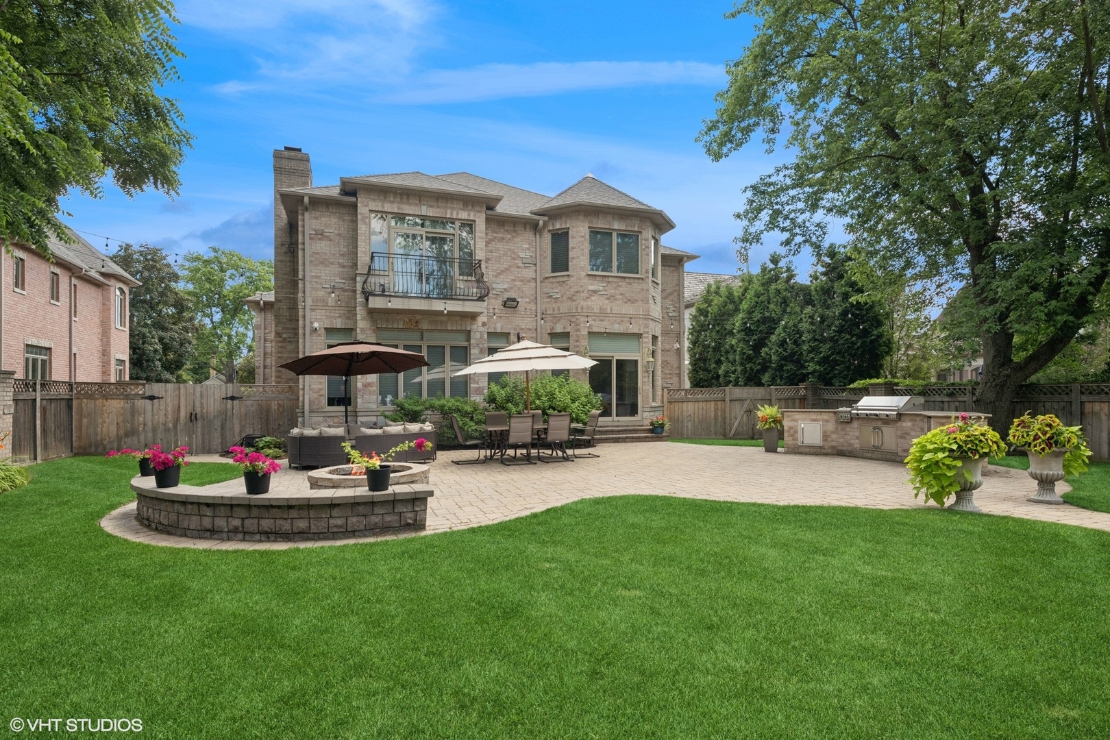 700 Greenwood Road Northbrook, IL 60062 - Photo 69 of 81 a front view of a house with garden and sitting area