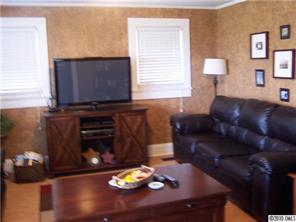 182 Weisner Road Olin, NC 28660 - Photo 2 of 10 a living room with furniture and a fireplace