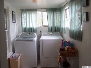 182 Weisner Road Olin, NC 28660 - Photo 8 of 10 a room with storage and utility