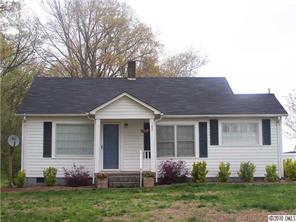 182 Weisner Road Olin, NC 28660 - Photo 10 of 10 a front view of a house with garden